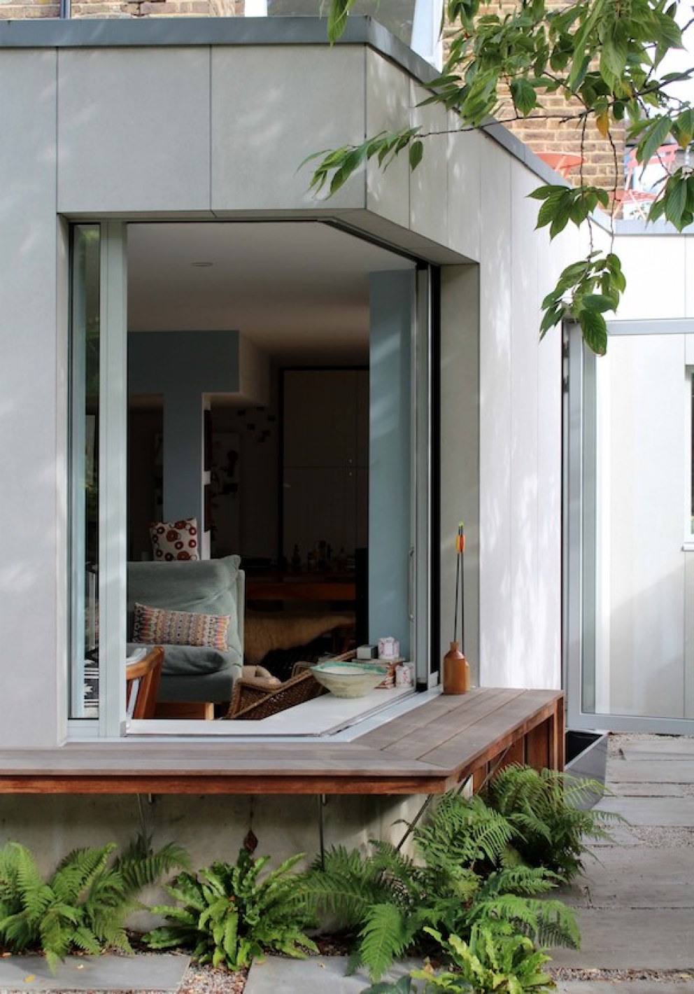 Garden flat extension | Corner glazing framing garden view | Interior Designers